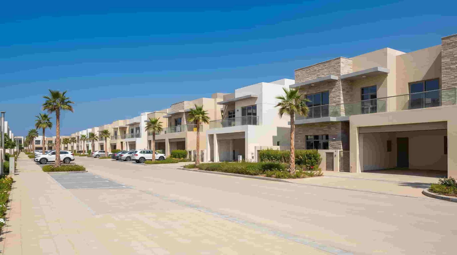 Row of modern townhouses on a quiet Dubai community street
