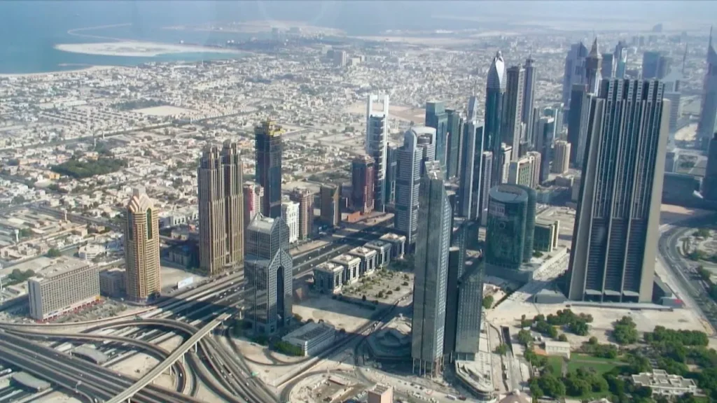 Aerial view of Sheikh Zayed Road skyscrapers and Palm Jumeirah from Burj Khalifa observation deck